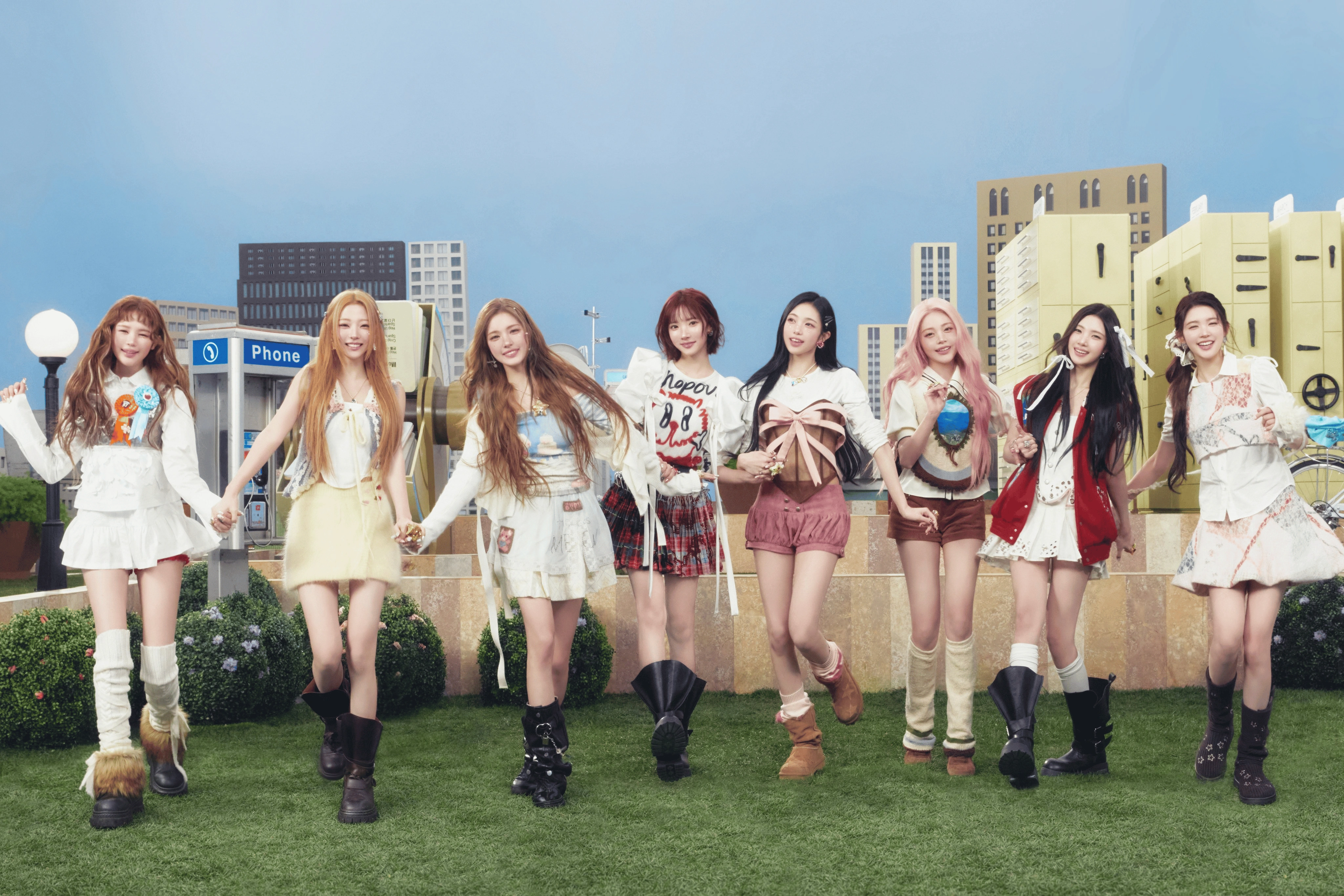 Hearts2Hearts group concept photo for RUDE!, all eight members holding hands on a sunny lawn