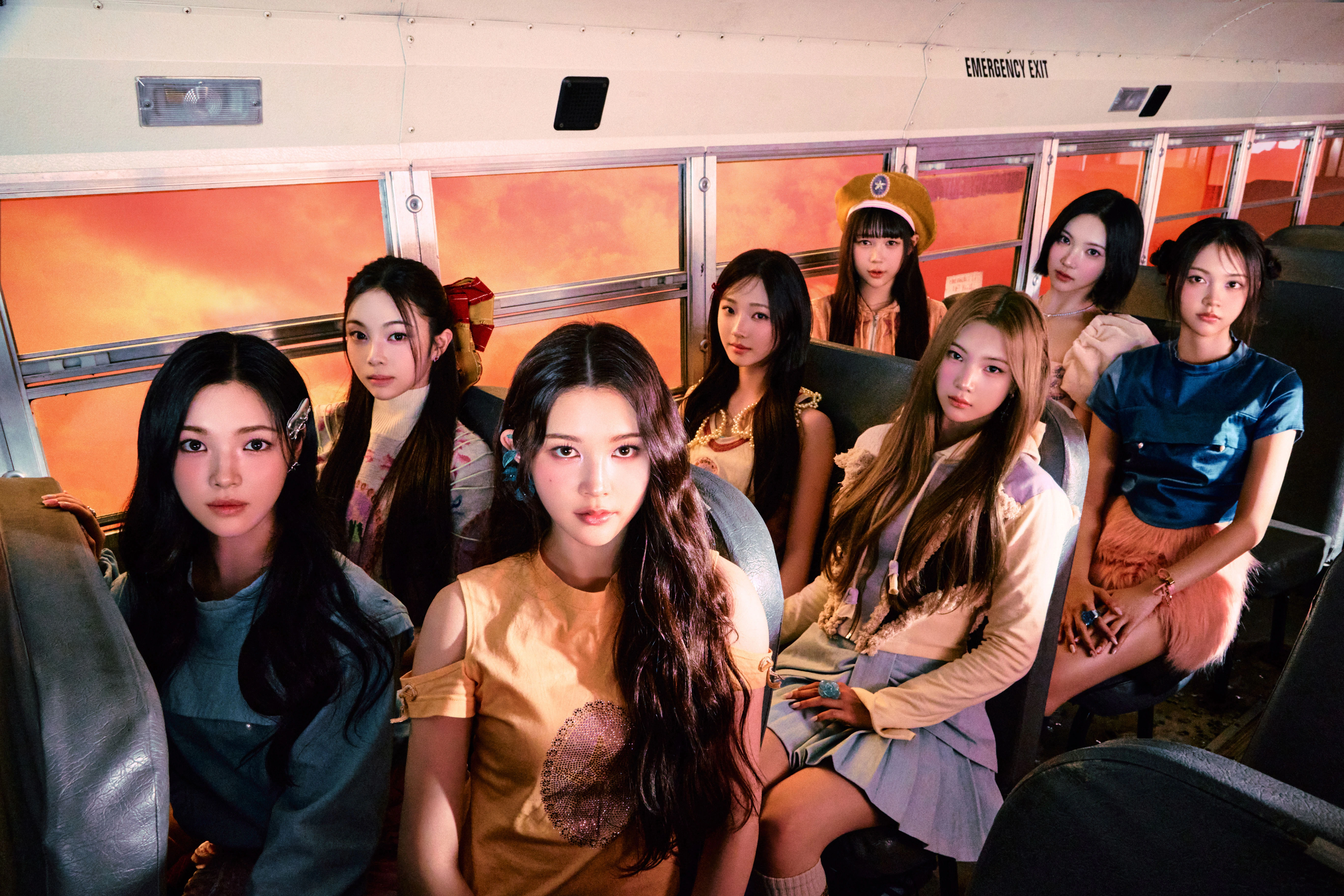 Hearts2Hearts group concept photo for The Chase, all eight members inside a school bus